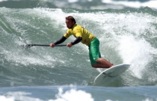  Paddle surfing in the waves 